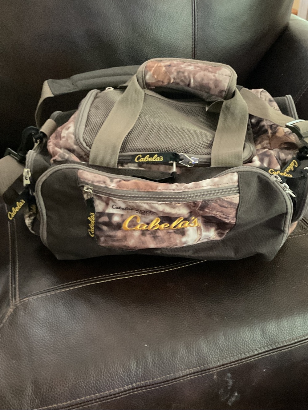Cabela's Camo and Olive Green Duffel Bag with Yellow Logo